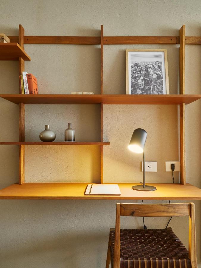Aq Tailored Suites Buenos Aires Exterior photo A desk lamp