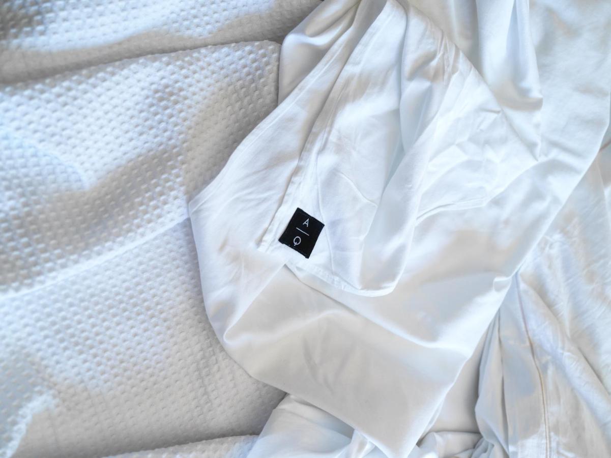 Aq Tailored Suites Buenos Aires Exterior photo A white sheet