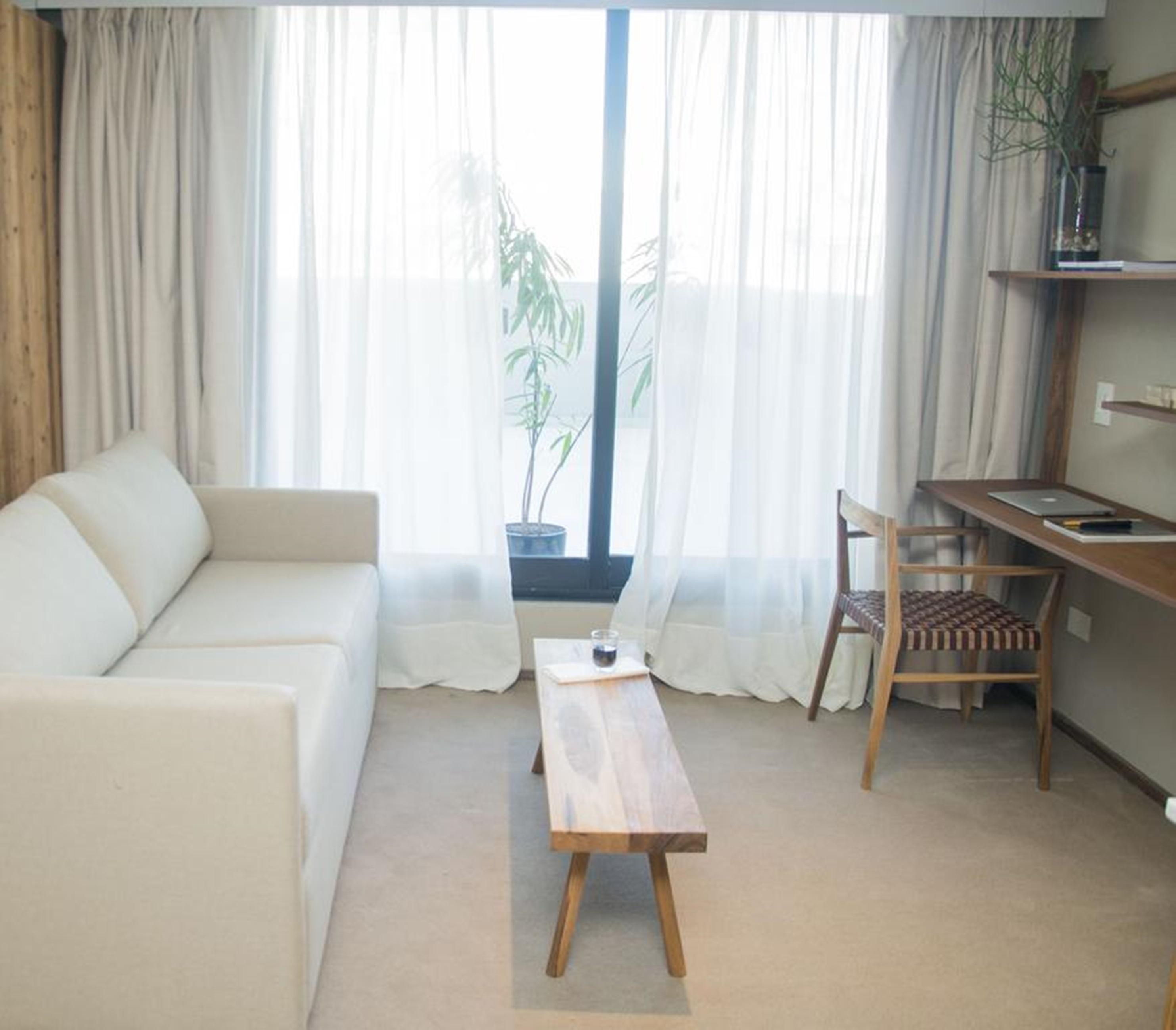Aq Tailored Suites Buenos Aires Exterior photo A room at the hotel