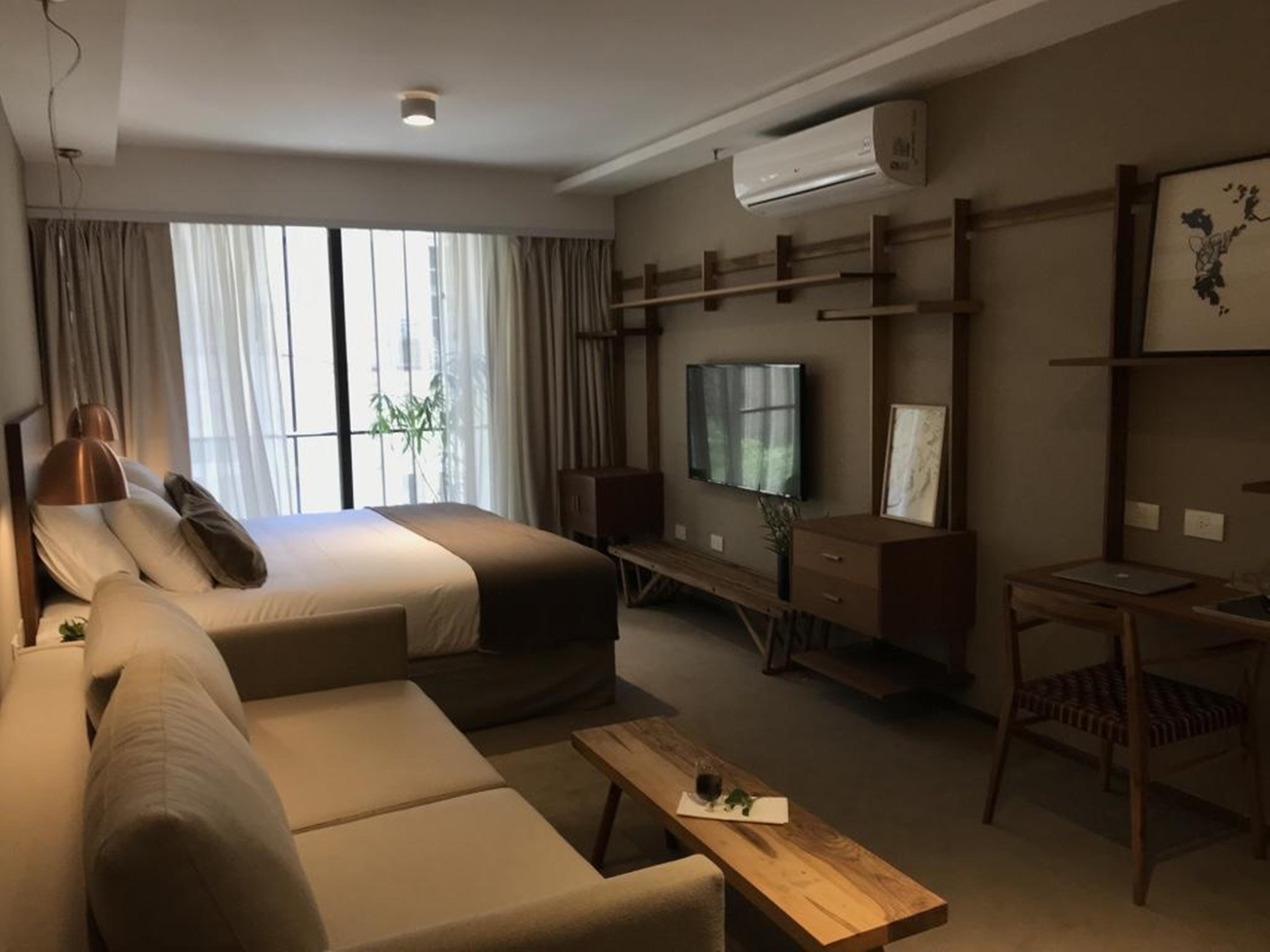 Aq Tailored Suites Buenos Aires Exterior photo A studio apartment in China