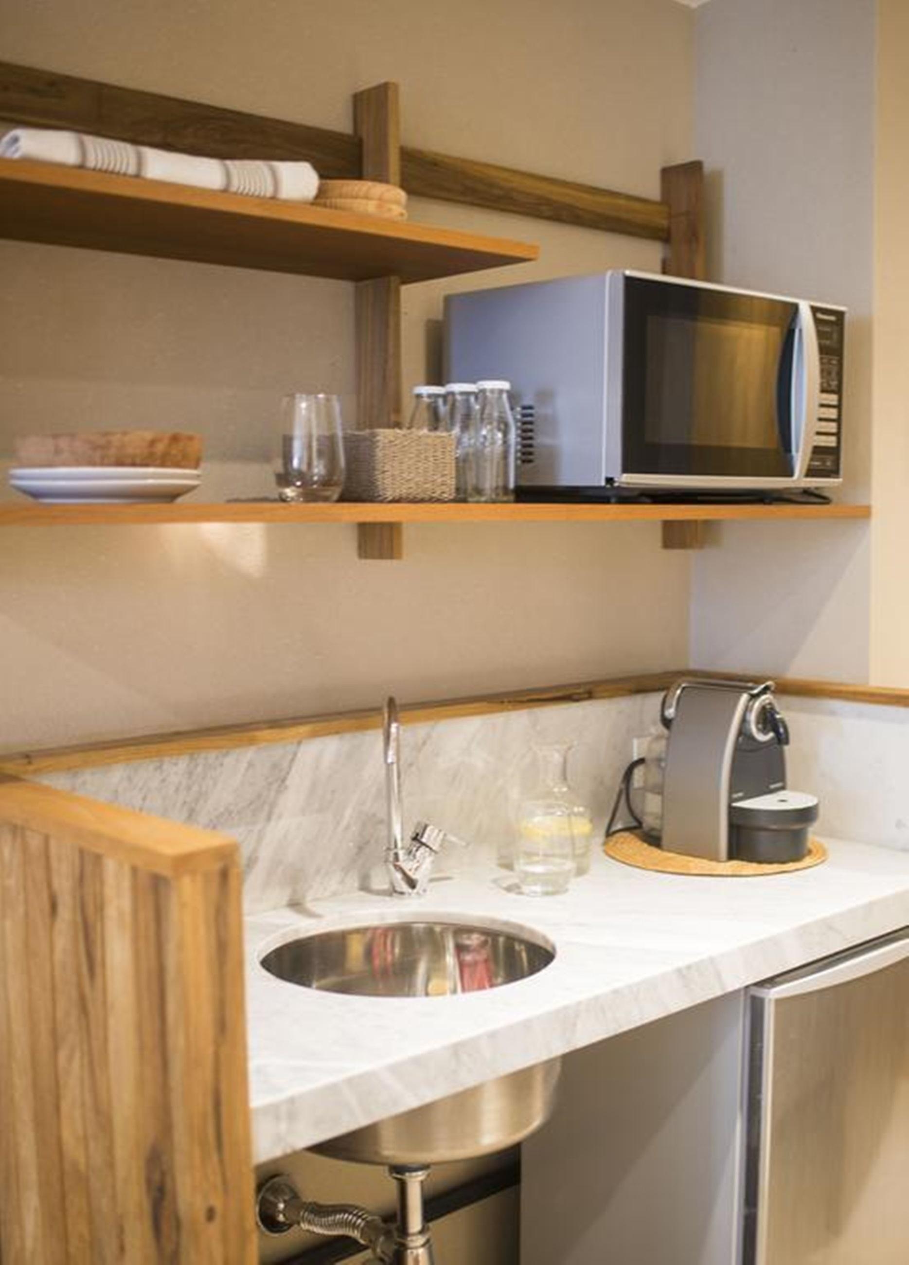 Aq Tailored Suites Buenos Aires Exterior photo A Nespresso coffee machine in a kitchen