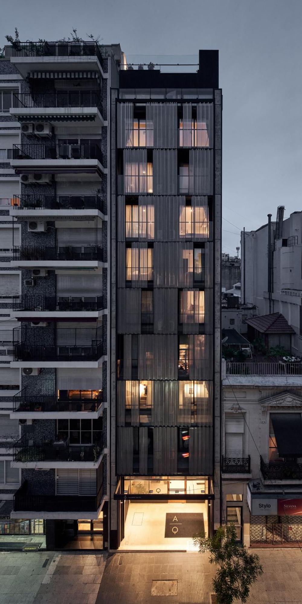Aq Tailored Suites Buenos Aires Exterior photo The building at night
