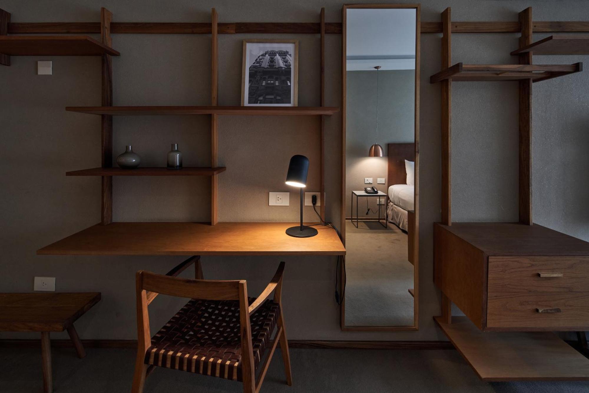 Aq Tailored Suites Buenos Aires Exterior photo A desk in a hotel room