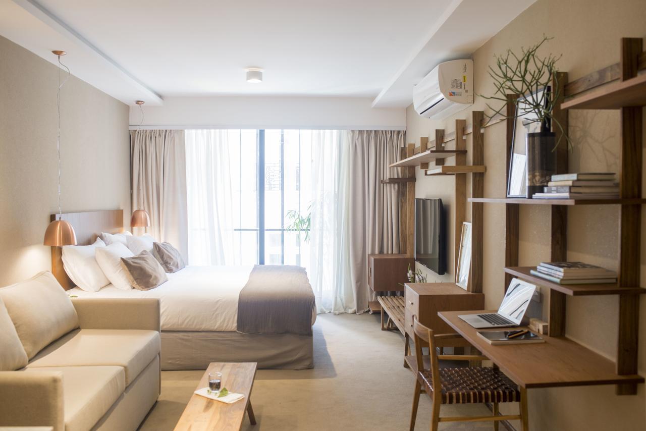Aq Tailored Suites Buenos Aires Exterior photo A room at the hotel