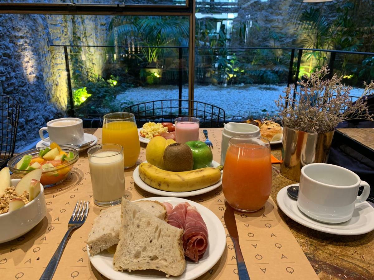 Aq Tailored Suites Buenos Aires Exterior photo A typical breakfast in a hotel