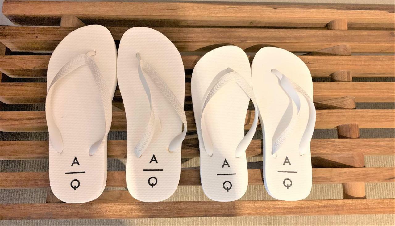 Aq Tailored Suites Buenos Aires Exterior photo A pair of AQ flip-flops