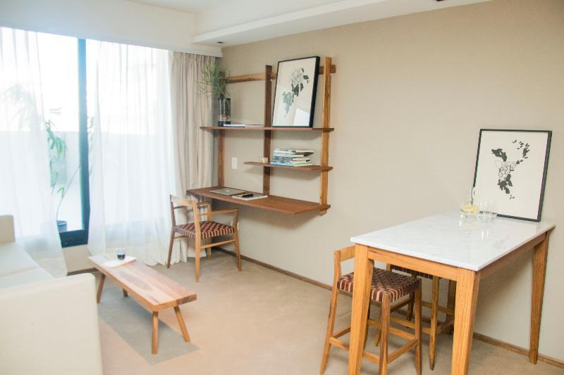 Aq Tailored Suites Buenos Aires Exterior photo A wall-mounted desk